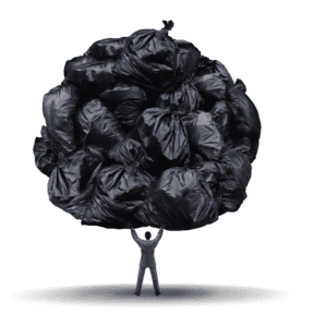 A business man in a suit holding up a huge pile of bin bags above his head. The result of clearing out his home office.